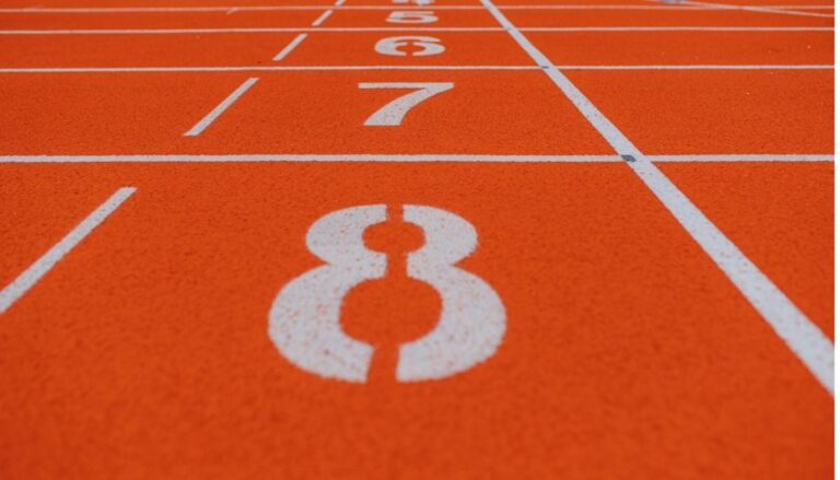 low-angle-view-numbered-starting-line-all-weather-track-and-field-in