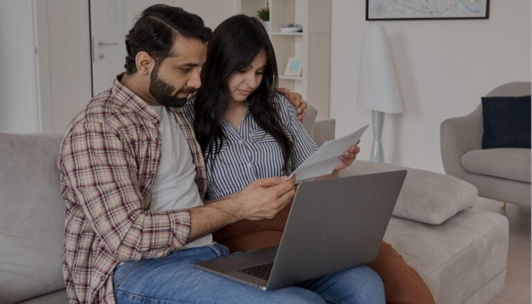 Couple reviewing information on the face amount of a life insurance policy