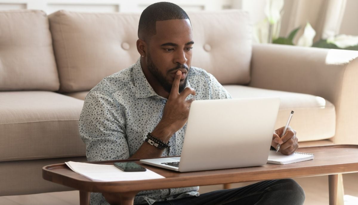 Young african american guy studying on online courses