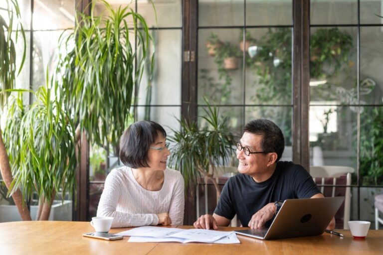 asian-couple-talking-about-buying-a-new-house