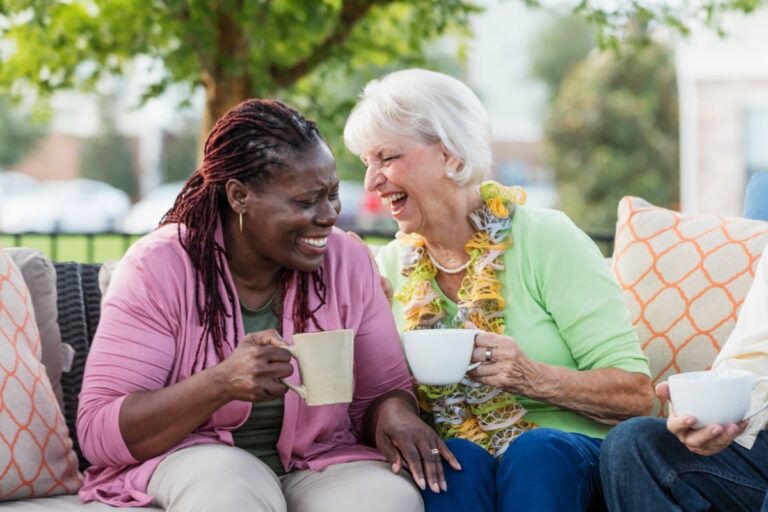 Two women discussing their whole life insurance