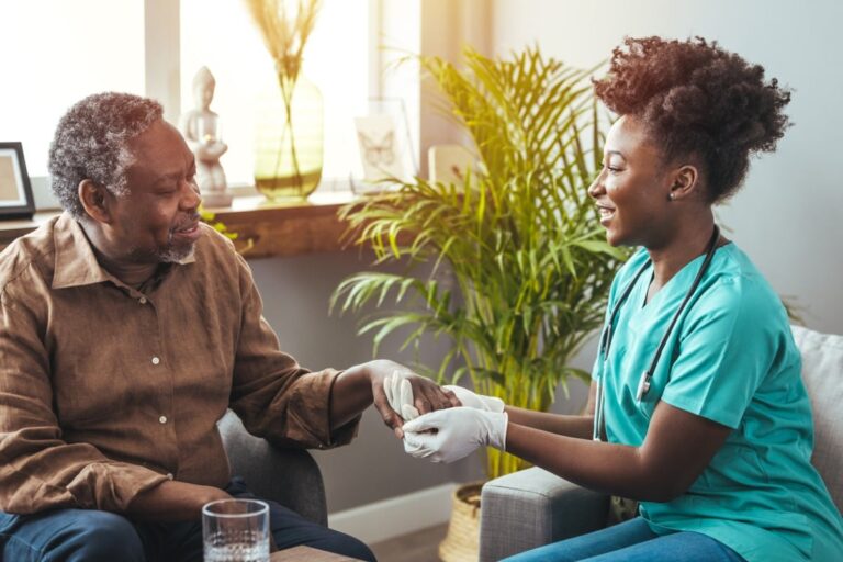 Man in long term care with nurse