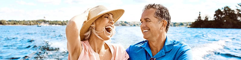 Couple smiling on a boat
