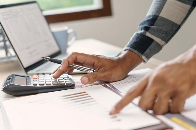 Person reviewing a cash value chart