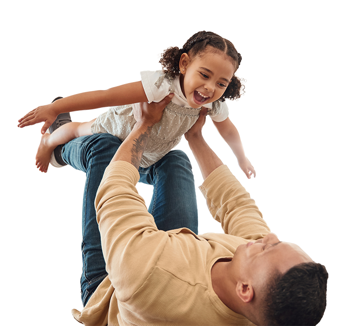 Father playing airplane with his young daughter